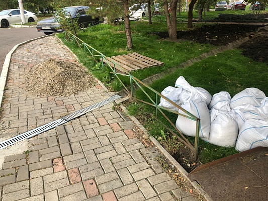 Выполнены работы по восстановлению отмостки ул. Д. Мартынова, 39. изображение 1